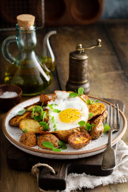 istock Air fried new potatoes topped with egg 1349560796