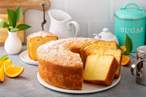 Traditional vanilla pound cake with orange extract, Bundt cake Traditional vanilla pound cake with orange extract, Bundt cake recipe cake stock pictures, royalty-free photos & images