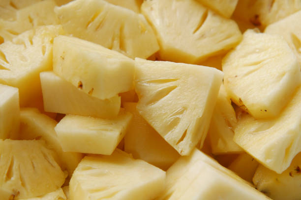 istock slice of pineapple in bowl on table 1349561770