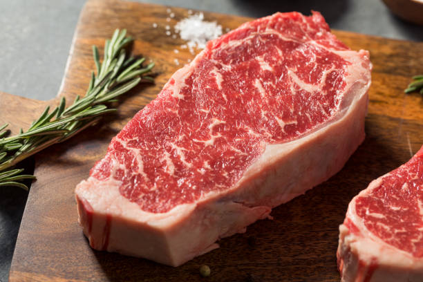 istock Raw Red Organic New York Strip Steak 1349564545
