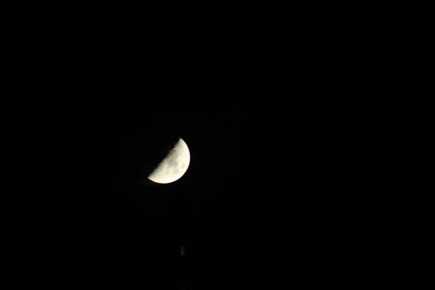 Half Moon in Night Sky stock photo