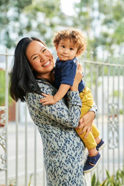istock Mother Holding Little Son 1349575672