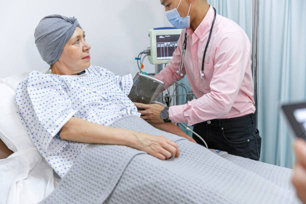 istock Hospitalized cancer patient having blood pressure checked 1349579555