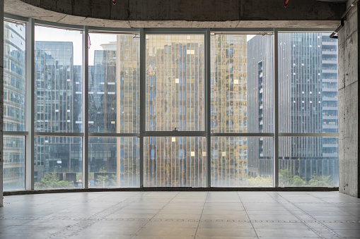 loft empty room with frame window and concrete floor. 3d rendering