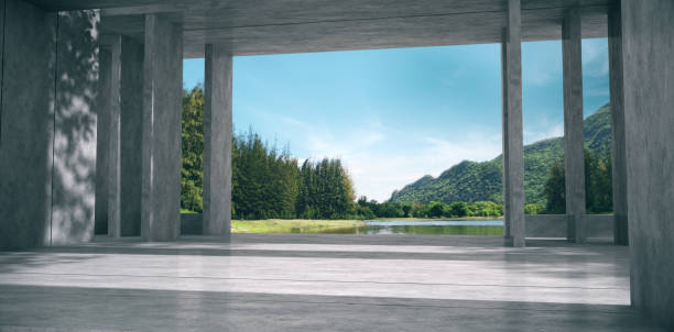 istock Empty space for products show in concrete hallway with park background. 1349581421