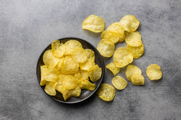 istock Crunchy potato chips. Potato crisps. 1349588066