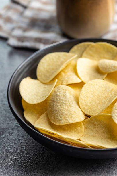 istock Crunchy potato chips. Potato crisps. 1349588067