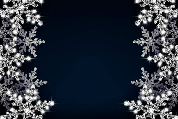 Banner with silver snowflakes vector illustration eps 10 Christmas banner with a border of white, sparkling snowflakes with bright glitter. Vertical layout. On a blue background. Vector. snowflake holiday greeting card blue stock illustrations