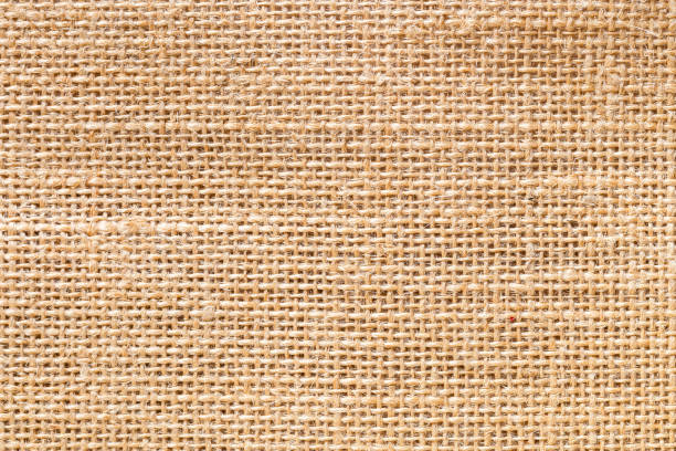 primer plano con textura de arpillera y fondo textil con fotograma completo. - textile burlap sewing patch fotografías e imágenes de stock