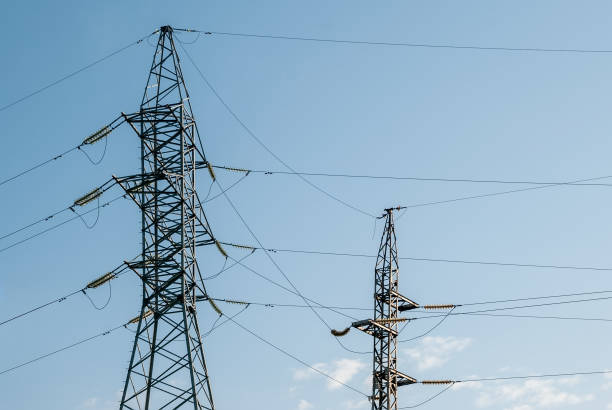 istock Electric power transmission tower. Electricity distribution infrastructure. Compressors Distribution Technology 1349599021