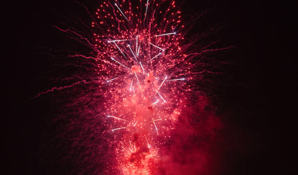 istock Holiday fireworks backgrounds with sparks, colored stars and bright 1349604466