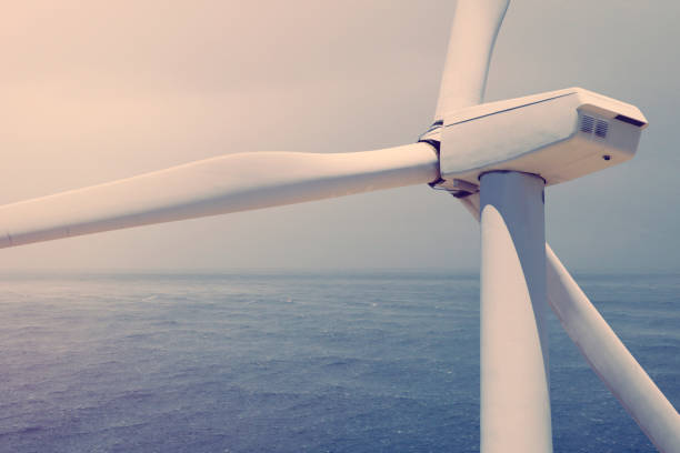 istock Wind turbine on the sea 1349604577