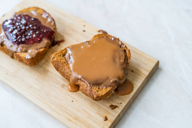 istock Peanut Butter with Dulce de Leche Milk Jam with Toast Bread. 1349610373