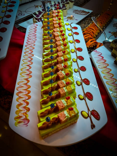 istock Cakes pies desserts sweets buffet 1349630365