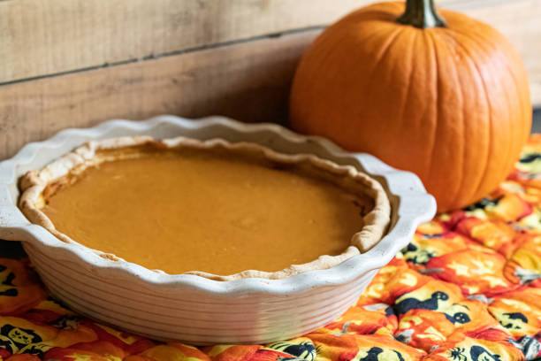 istock Homemade pumpkin pie  with pumpkin 1349631089