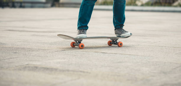 istock Skateboarder skateboarding outdoors in city 1349631224