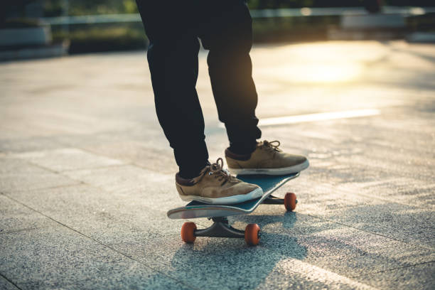 istock Skateboarder skateboarding outdoors in city 1349632454