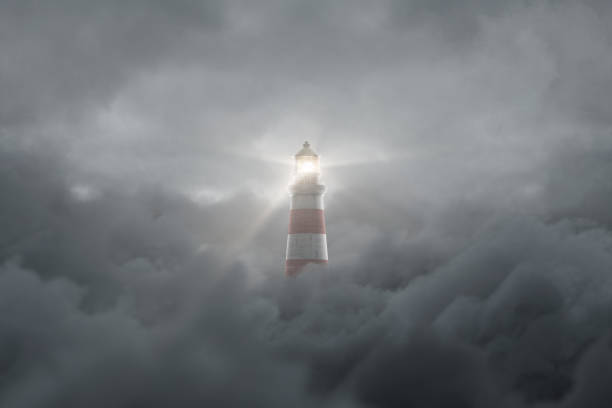 istock 3d rendering of an illuminated lighthouse over fluffy darken clouds 1349643429