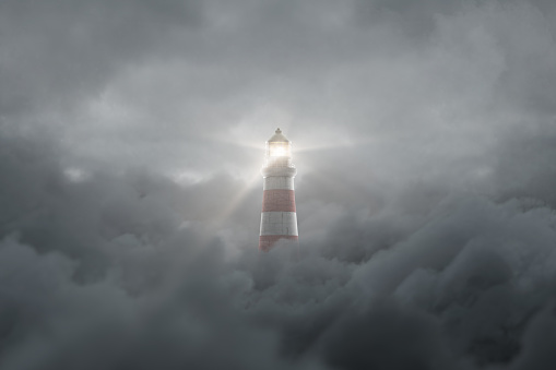 3d rendering of an illuminated lighthouse over fluffy darken clouds