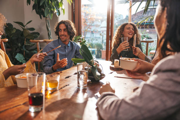 istock Friends dining at home 1349647956