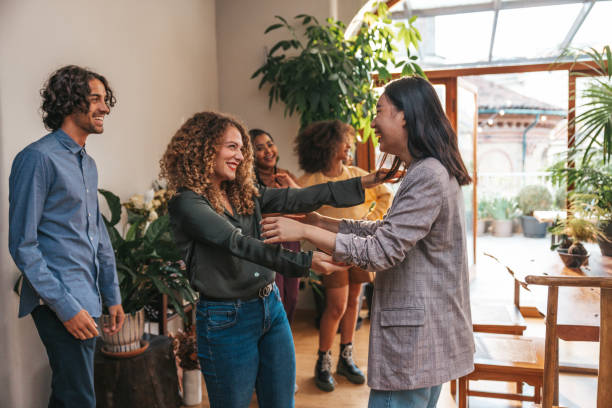 istock Friends catching up after a long time for a party 1349653078