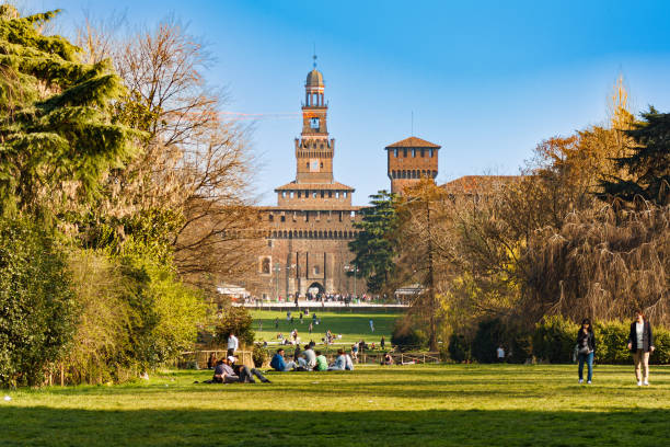view of the parco sempione and the sforzesco castle. - milan italy italy castello sforzesco color image imagens e fotografias de stock