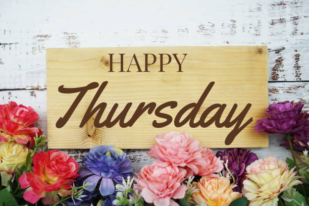 istock Happy Thursday text on wooden planks decoration with flower border frame 1349661498