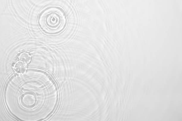 istock desaturated transparent clear calm water surface texture 1349662418