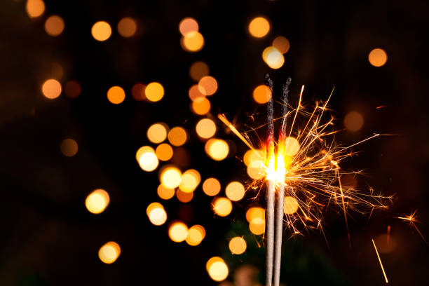 istock Burning sparkler in a christmas atmosphere at night 1349668289