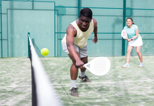 istock Padel tennis players play with passion 1349668670