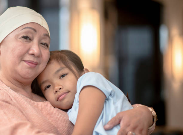 istock Cuddling with Grandma as she Fights Cancer 1349670274