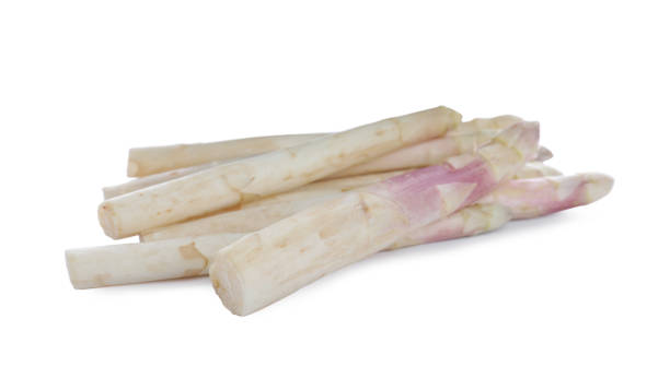 istock Pile of fresh raw asparagus isolated on white 1349671253