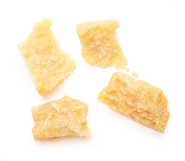 istock Pieces of parmesan cheese isolated on white background. Pattern. Set. Parmesan  top view. Flat lay. 1349671446