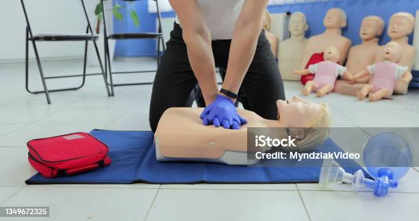 Cpr Training And First Aid Instruction First Aid Cardiopulmonary Resuscitation Stock Photo - Download Image Now
