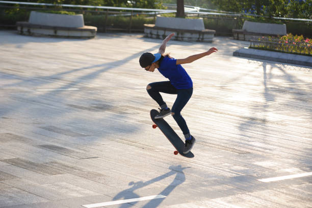 istock Skateboarder skateboarding outdoors in city 1349672414