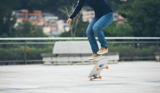 istock Skateboarder skateboarding outdoors in city 1349673325