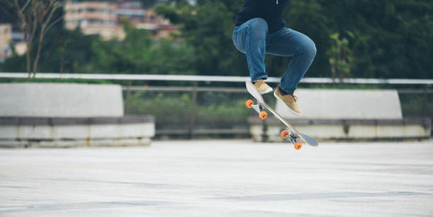 istock Skateboarder skateboarding outdoors in city 1349674496