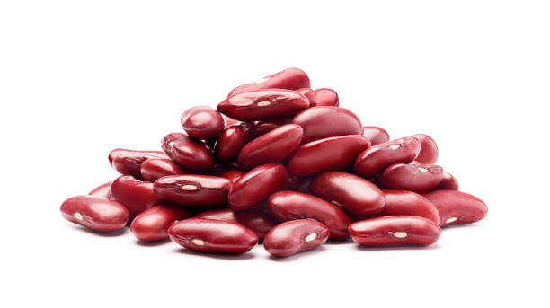 istock Heap of red kidney beans isolated on white background 1349674907