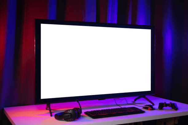 istock Blank screen display computer pc with gaming gear joystick mouse keyboard mouse. Gamer gadget background in game station. 1349678654