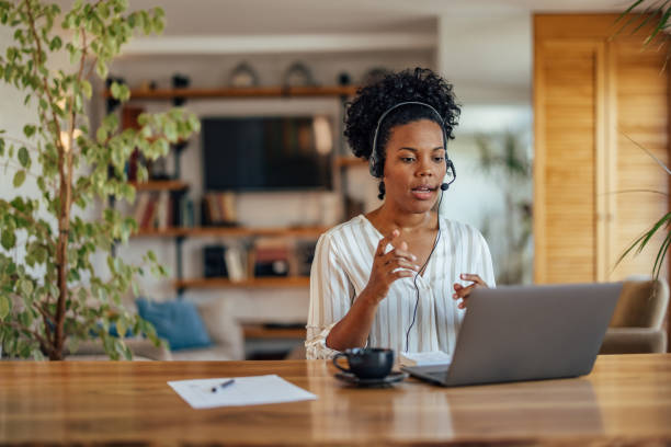 istock Confident woman, having a conversation with a customer 1349678736