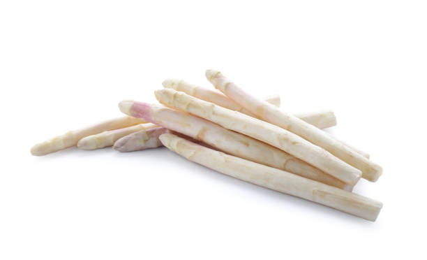 istock Pile of fresh raw asparagus isolated on white 1349684040