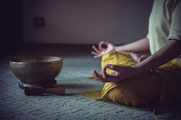 istock Meditation at house with Tibetan sing bowl 1349685432