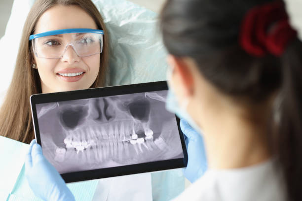Smiling woman in dentist chair