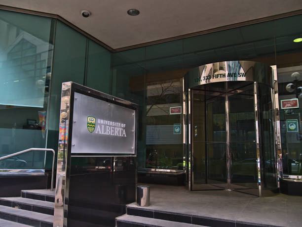 Entrance of University of Alberta Calgary Centre in downtown with logo on sign in front at 5 Ave SW. stock photo