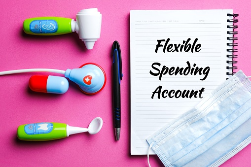 Flatlay of kids medical toy with other prop for Flexible Spending Account