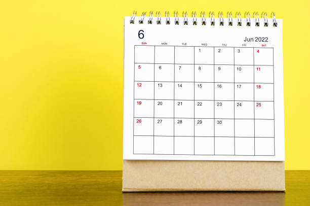 istock The June 2022 desk calendar with yellow background 1349701035