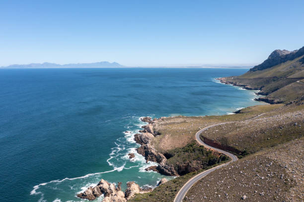 istock Road running along an extreme coastline 1349701128