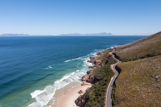 istock Road running along an extreme coastline 1349701165