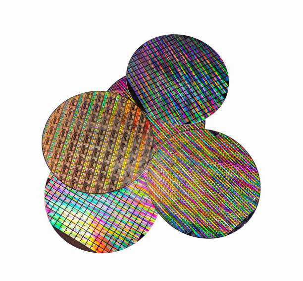 istock Silicon wafer with chips isolated on white background 1349706944