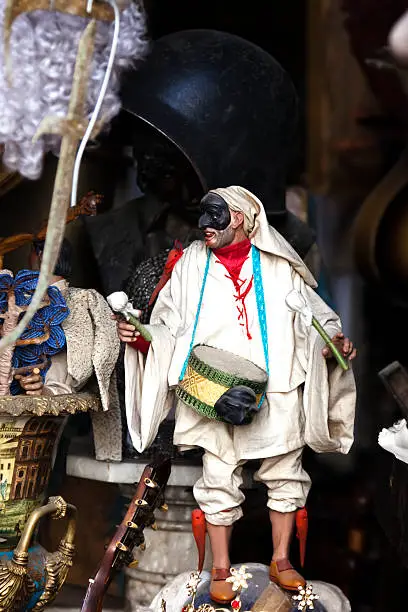 An antique typical Neapolitan mask, Pulcinella, often called Punch or Punchinello in English, Polichinelle in French.